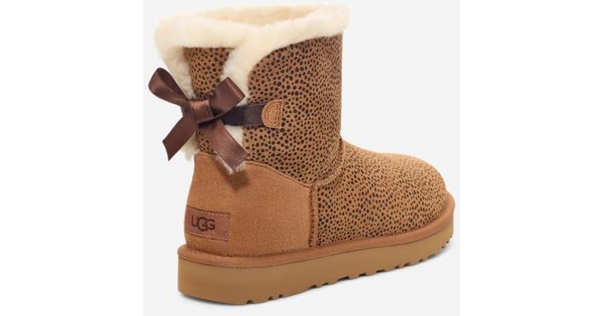 UGG ® Mini Bailey Bow Micro Cheetah Suede Classic Boots in Brown