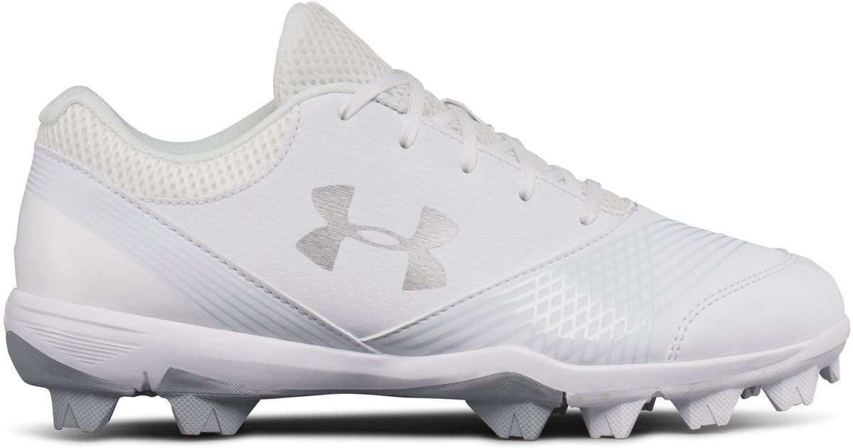 white molded softball cleats