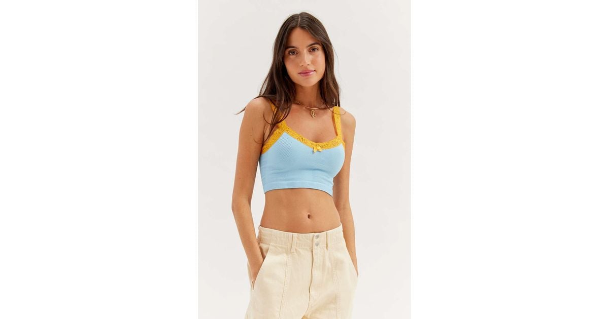 https://cdna.lystit.com/1200/630/tr/photos/urbanoutfitters/696e39e1/out-from-under-Sky-Blue-Orange-So-Sweet-Lace-Seamless-Bra-Top.jpeg
