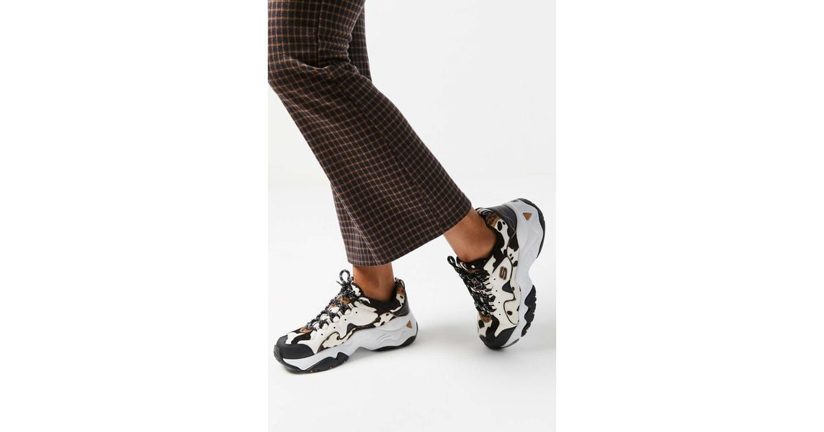 Skechers Uo Exclusive D-lites 3 Cow Printsneaker | Lyst