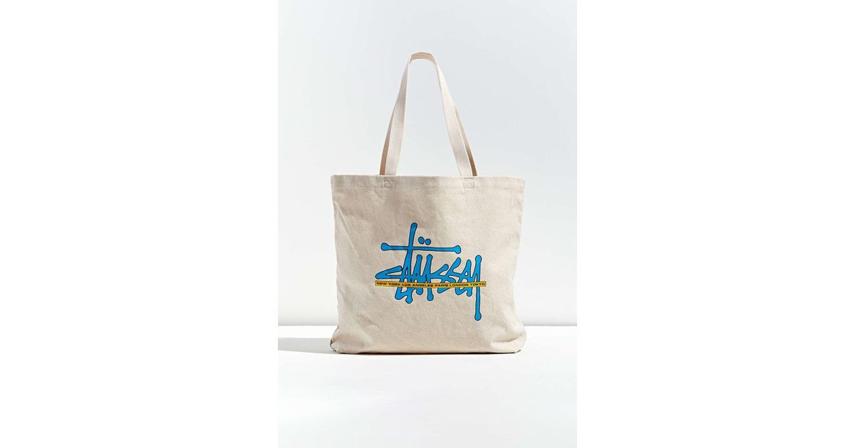 stussy world tour tote bolsa
