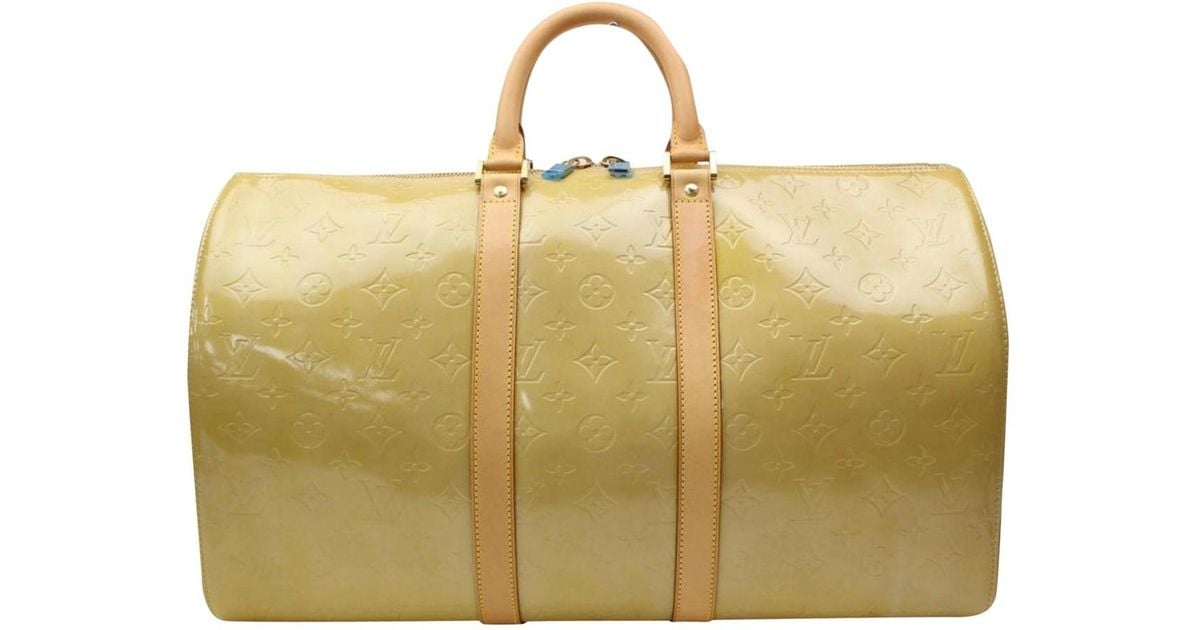 Louis Vuitton Pre-owned Vintage Keepall Yellow Patent Leather Travel Bags in Yellow - Lyst