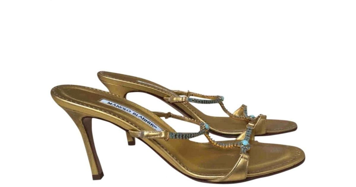 manolo blahnik gold flats