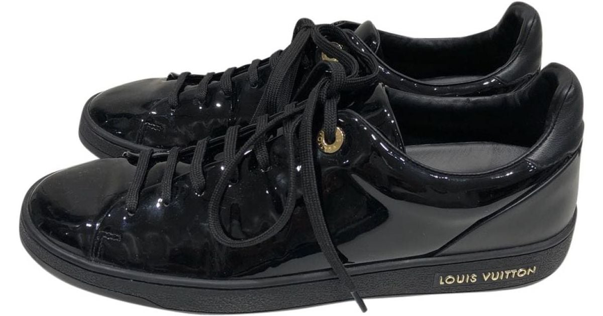 black patent trainers