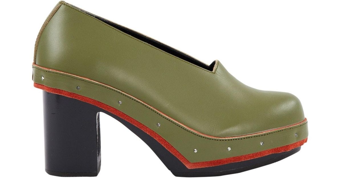 green leather clogs
