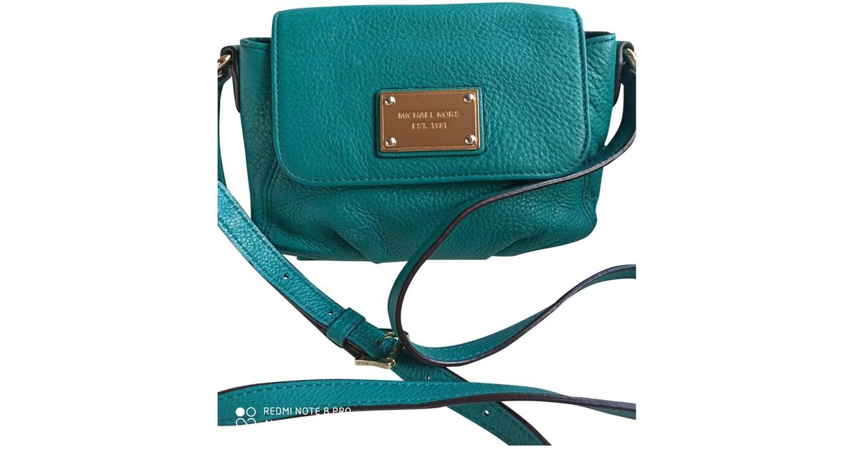 michael kors turquoise and brown leather bag