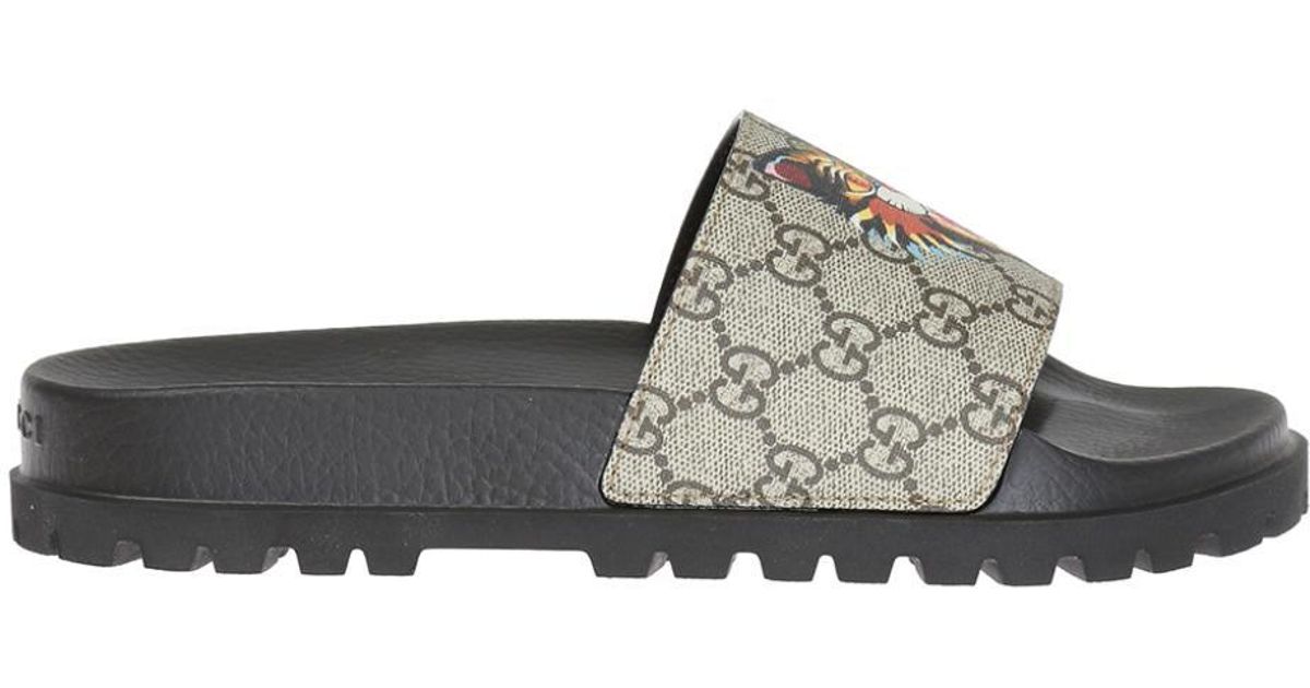 gucci slides with lion