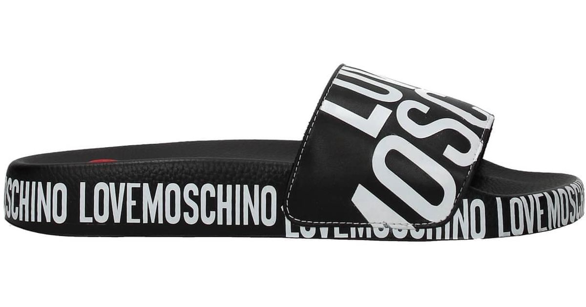 Love Moschino Slippers And Clogs Polyurethane Black in White | Lyst