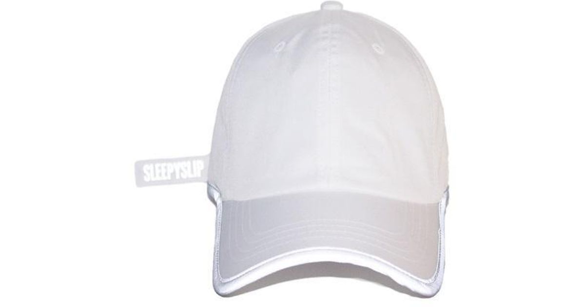 white ball cap