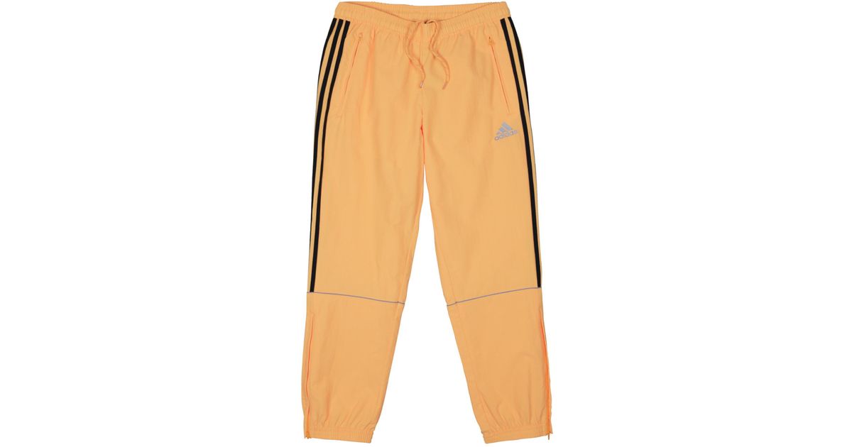 orange track pants adidas