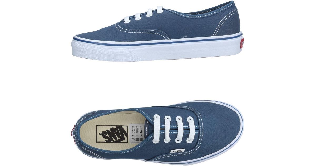 tan and blue vans