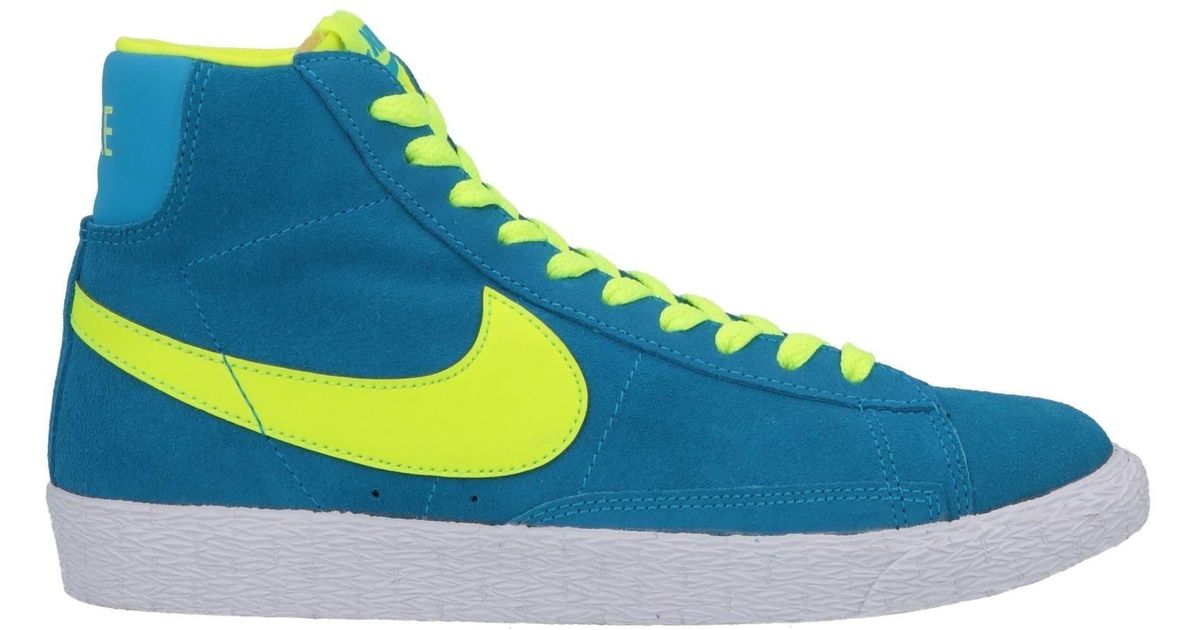 blue and yellow nike high tops