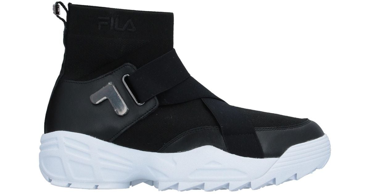 all black fila trainers