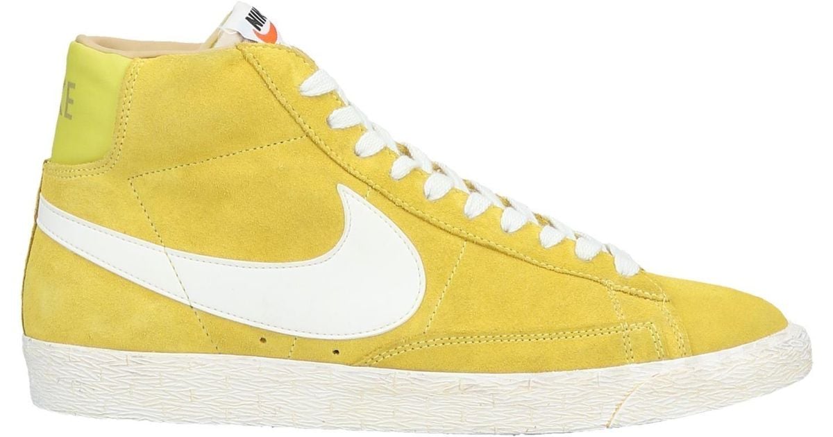 nike yellow and black high tops
