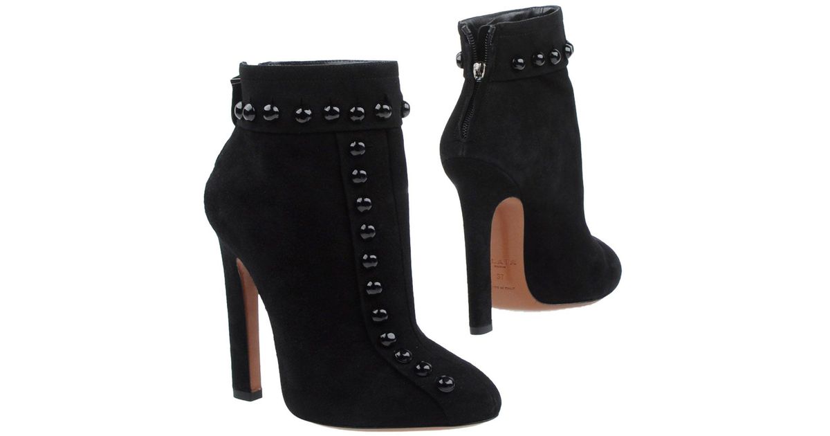 Alaïa Leather Ankle Boots in Black - Lyst
