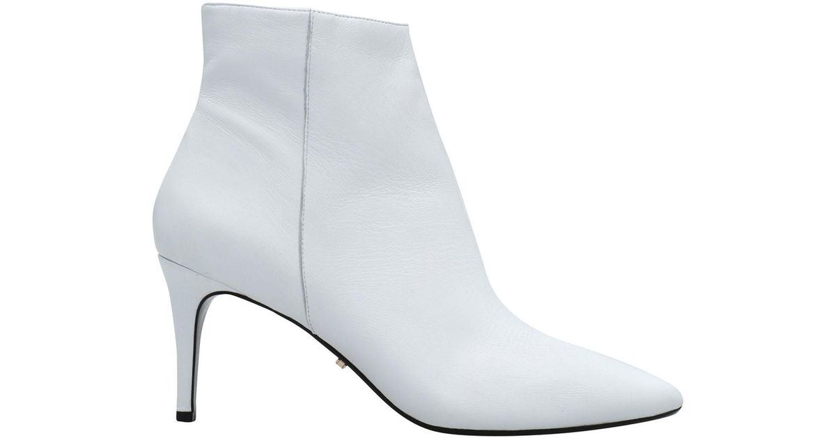 dune white ankle boots