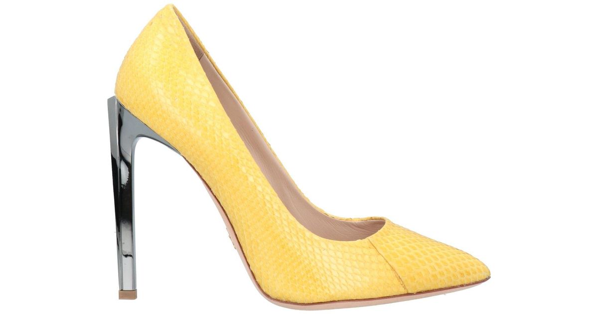 designer yellow pumps