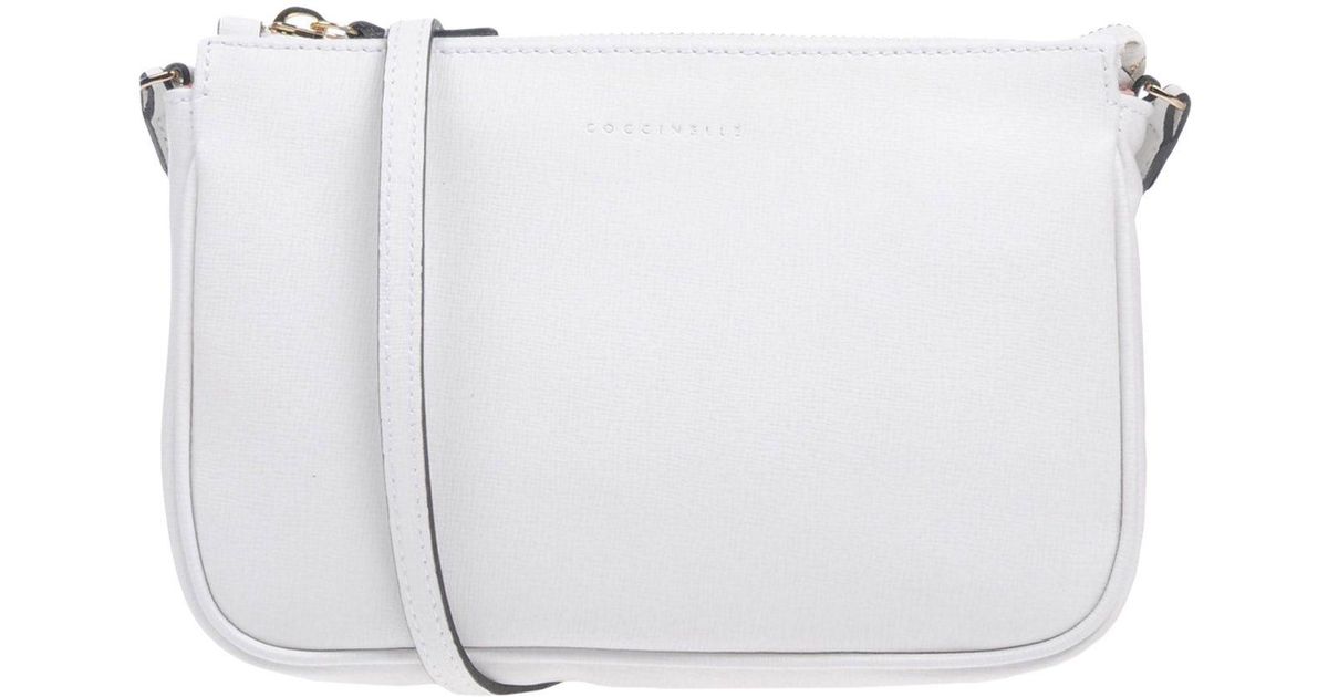 Lyst Coccinelle Cross Body Bag In White