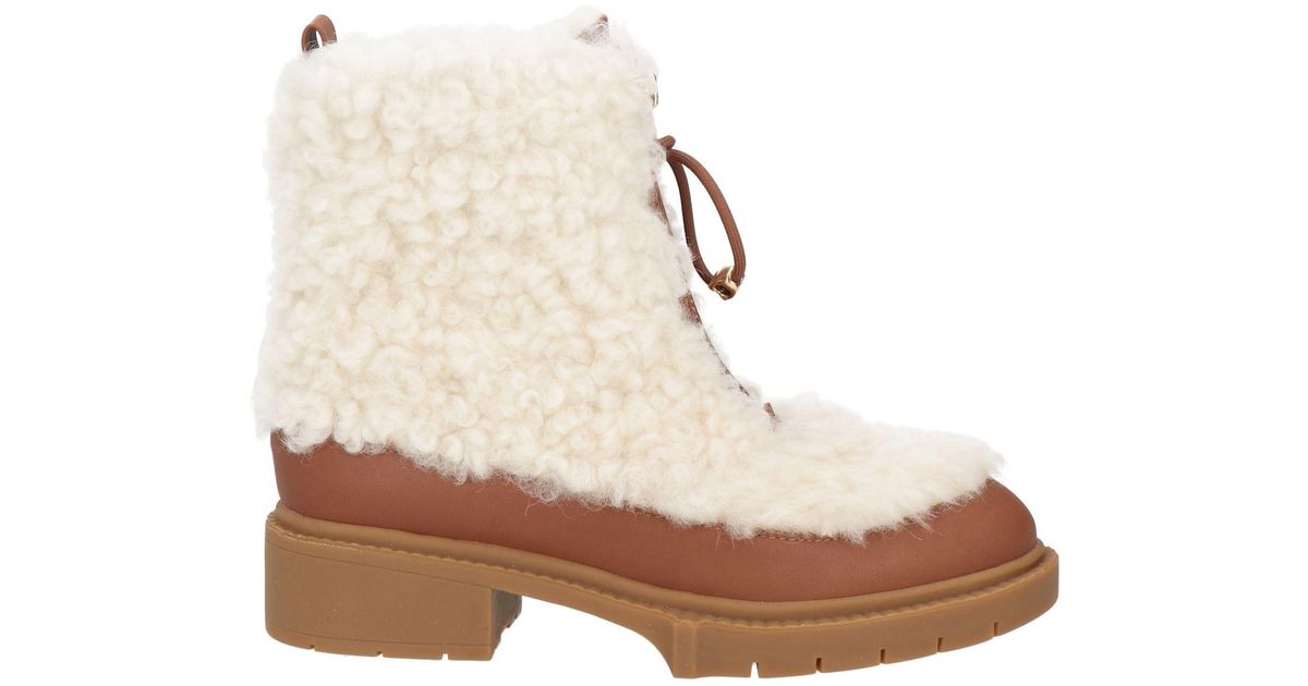 Coach shearling boots sales