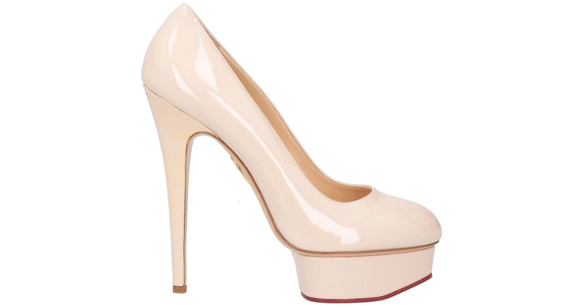Charlotte Olympia Pumps in Natural | Lyst