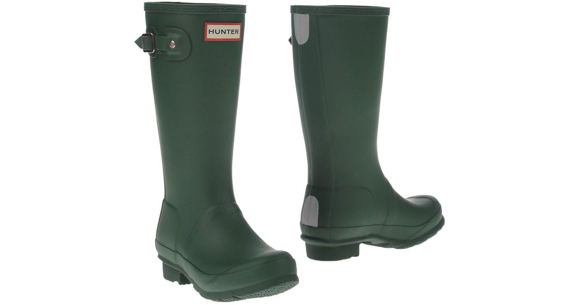 dark green hunter rain boots