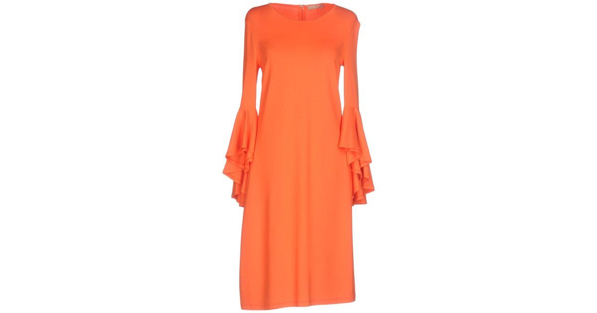 orange knee length dress