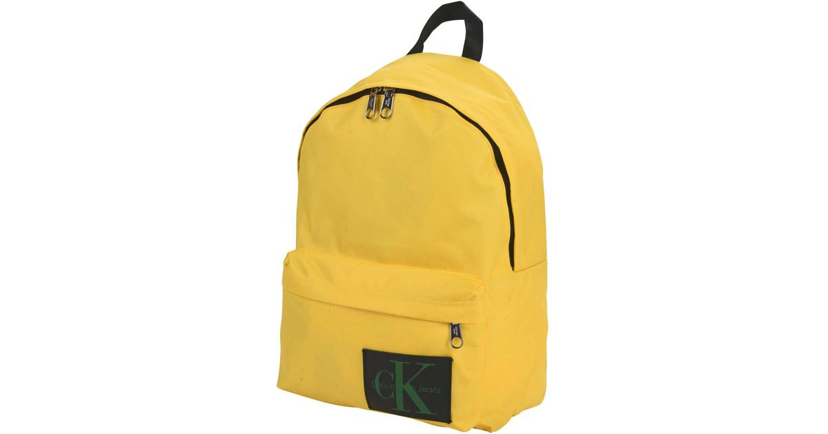 calvin klein yellow backpack