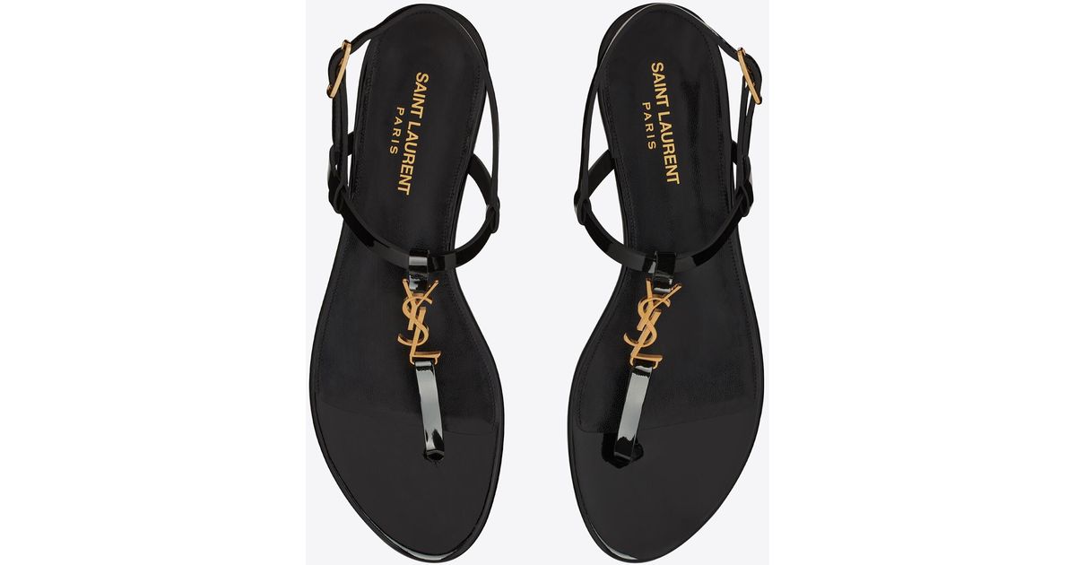 Saint Laurent Cassandra Flat Sandals In Patent Leather With Gold-tone ...