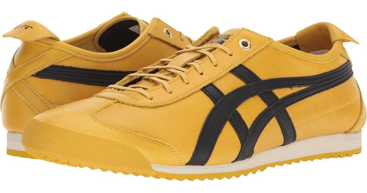 yellow asics sneakers