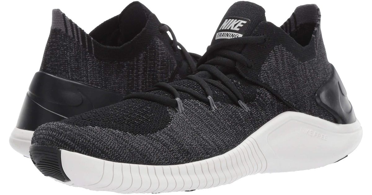 nike training free tr flyknit sneakers in gray and blue