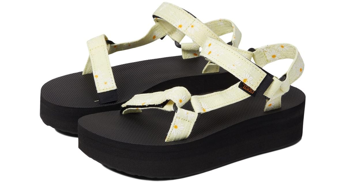 Teva Synthetic Flatform Universal Gloriosa in Yellow | Lyst