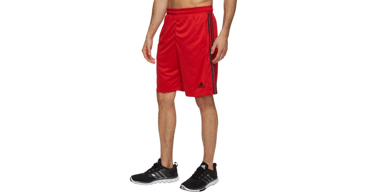 black adidas shorts with red stripes