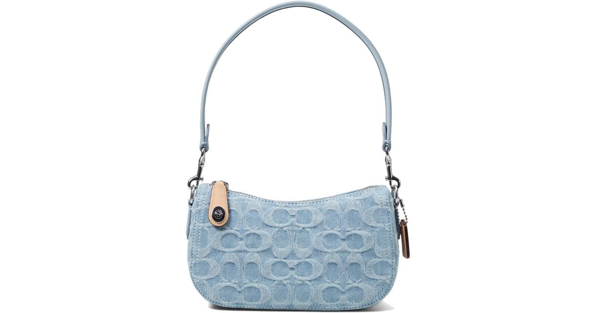 COACH Washed Denim Signature Swinger 20 in Blue Lyst