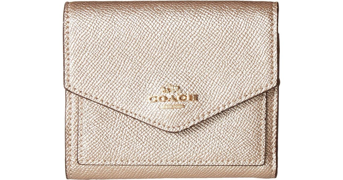 coach metallic wallet