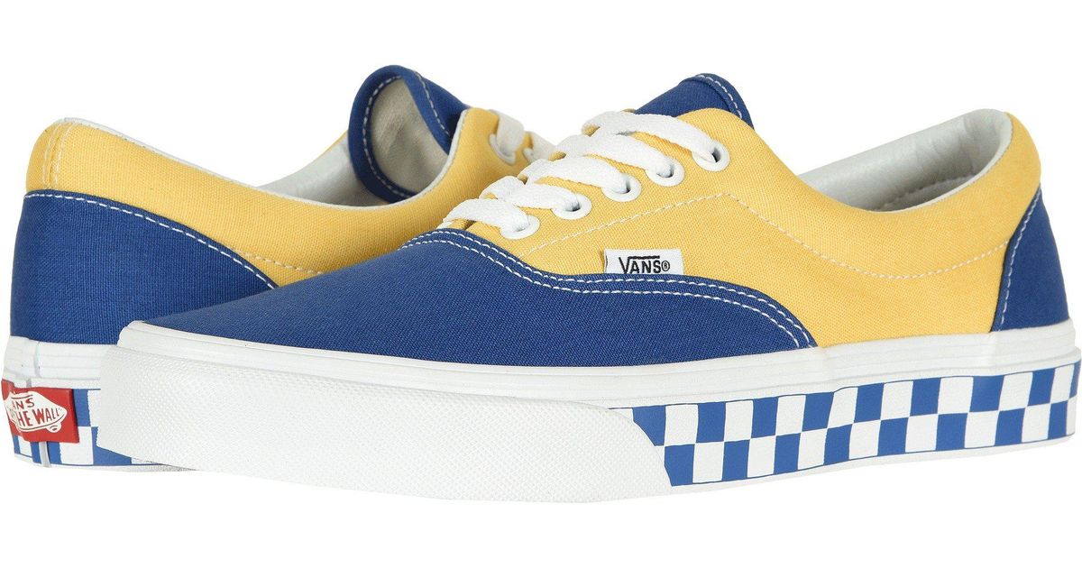 blue and yellow checkerboard vans