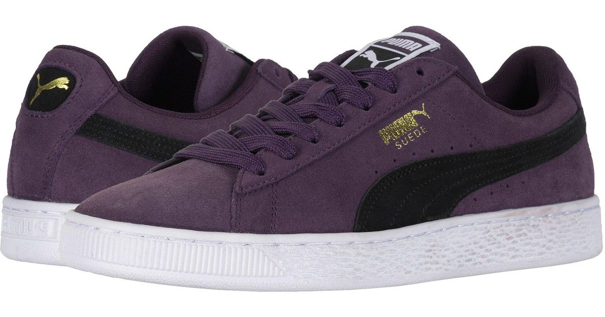 black and purple puma shoes