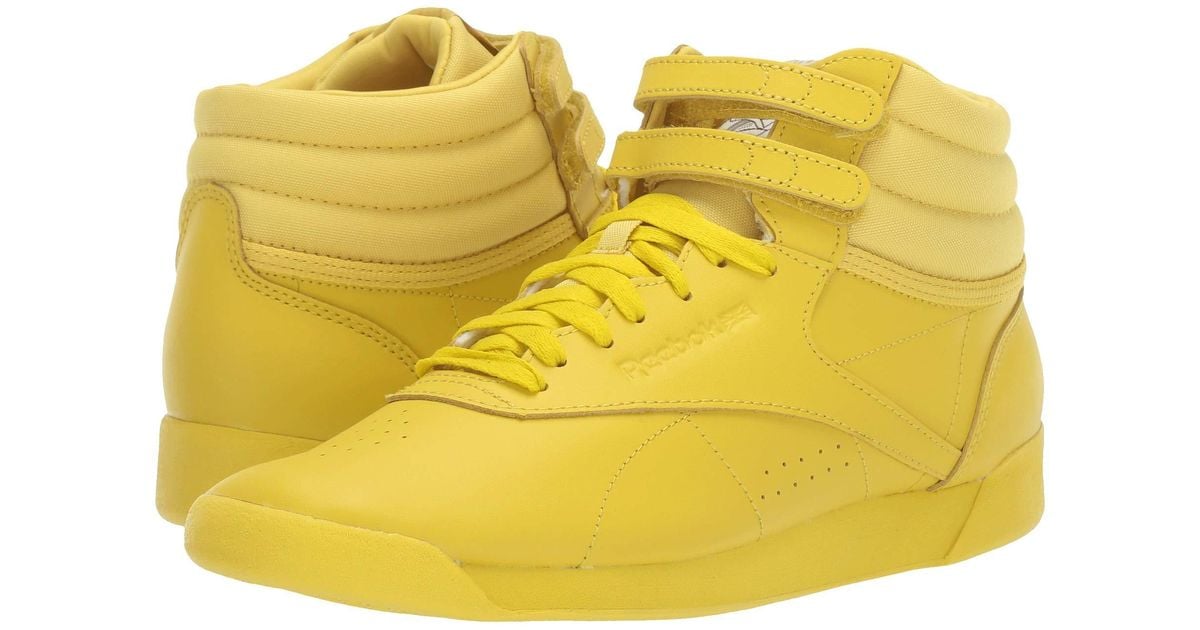Reebok Leather Freestyle Hi in Yellow 