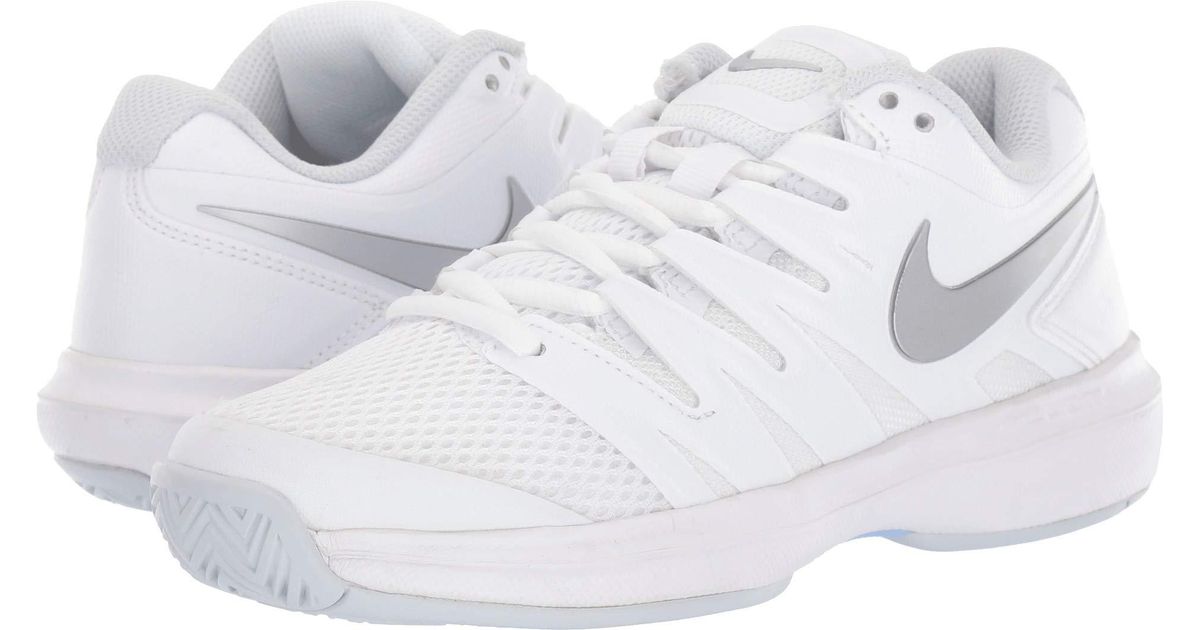 rose gold nike tennis shoes