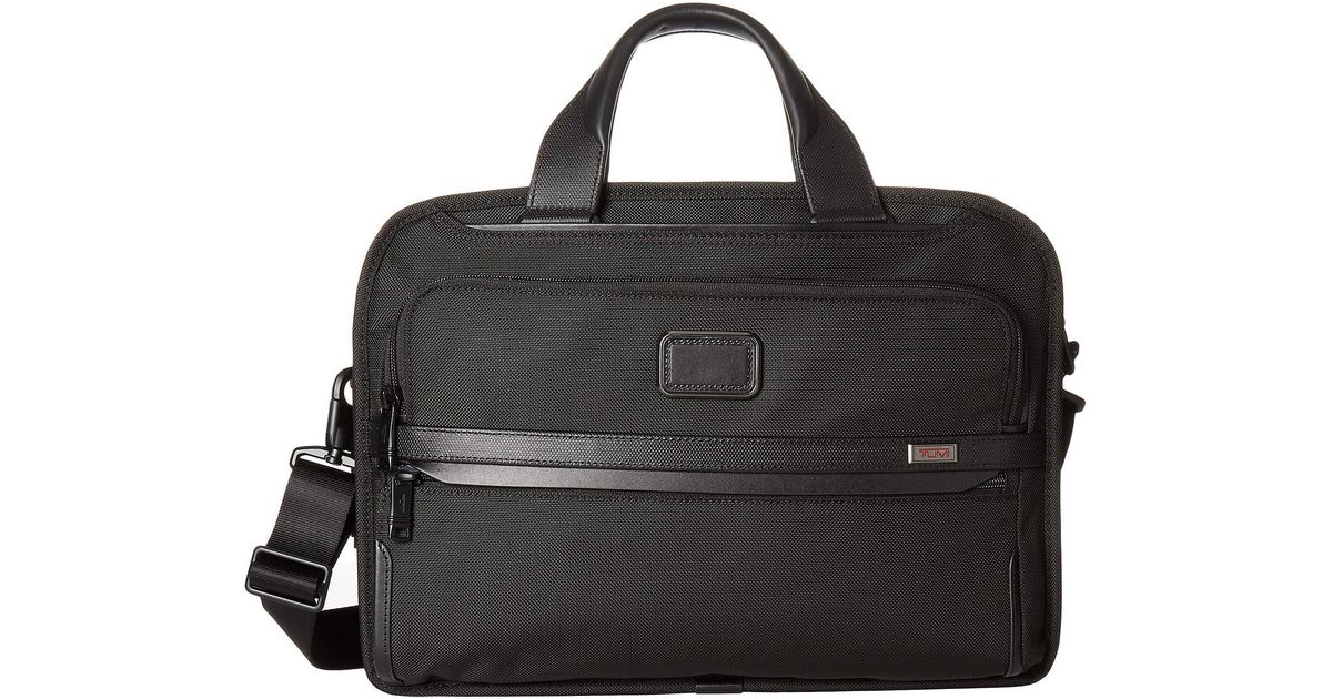 tumi triple compartment brief