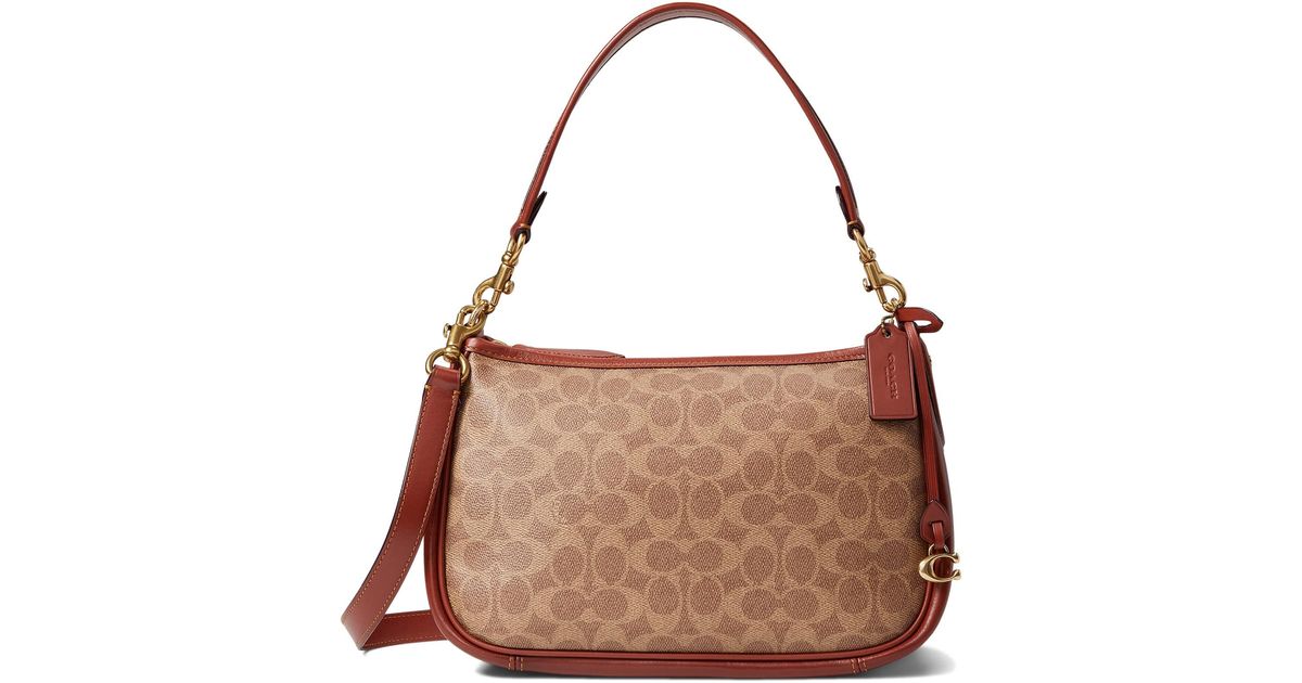 COACH Coated Canvas Signature Cary Crossbody in Brown Lyst