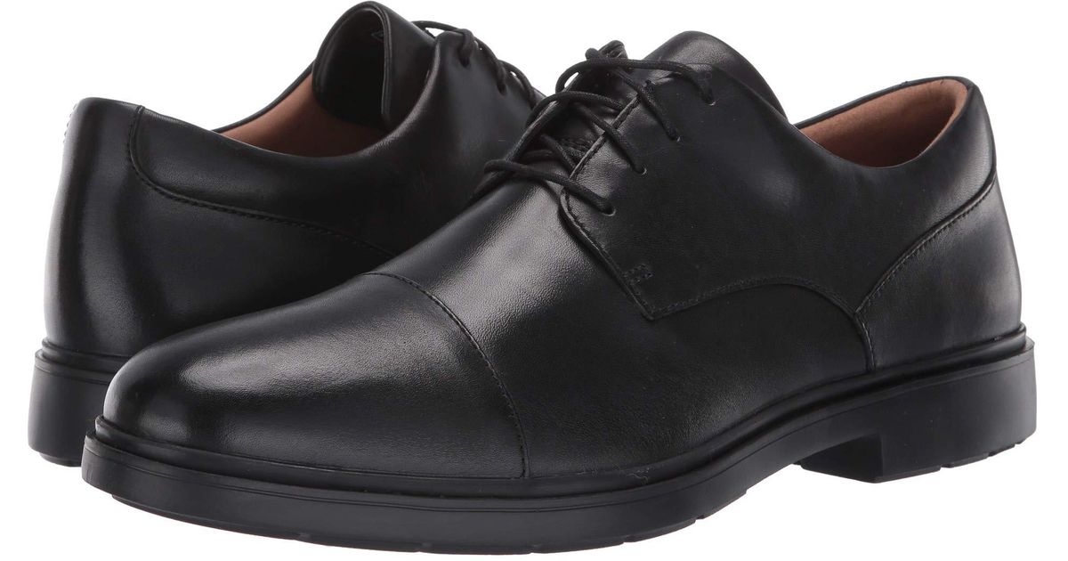 un tailor cap tan leather