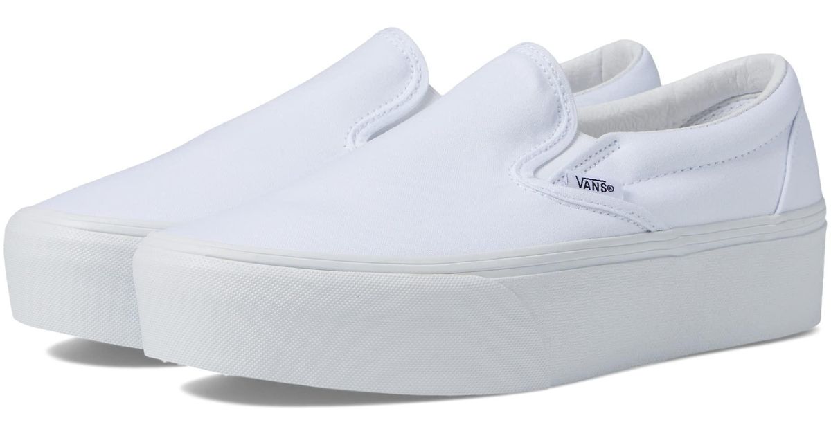 white platform vans slip ons