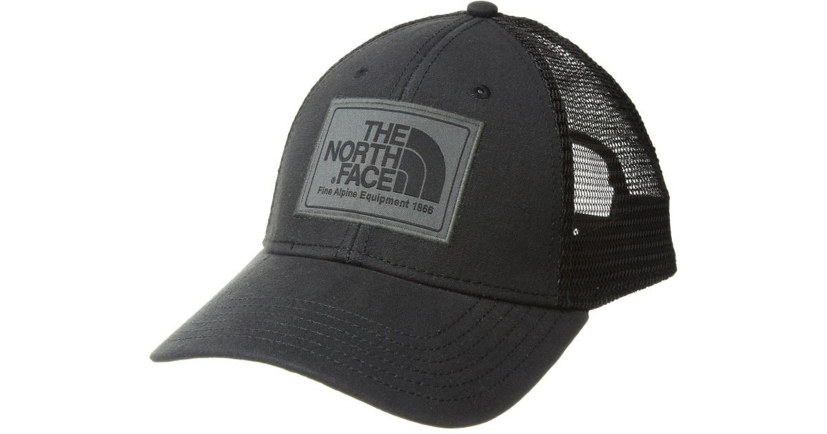 black north face trucker hat