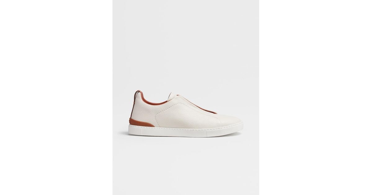 off white deerskin triple stitch sneakers