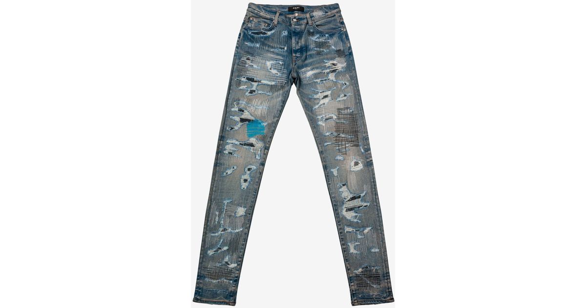 Amiri All Over Repair Clay Indigo Jeans in Blue for Men | Lyst