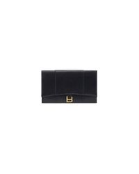 Balenciaga Bolsito plano con solapa hourglass de becerro box - Negro