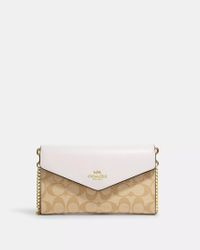 COACH®  Phone Crossbody In Signature Canvas With Bee Print