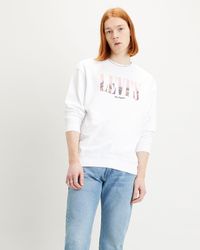 Sudadera blanca de cuello redondo con estampado de surf Peanuts Snoopy  Levi's de Algodón de color Blanco para hombre | Lyst