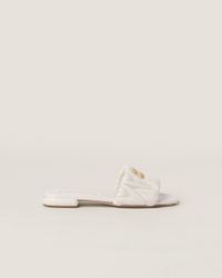 サンダル・ミュール MiuMiu | Matelasse nappa leather cork heel sandals 5XZ482 miu-miu-Sand-Beige-Matelasse-