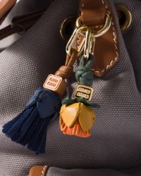 Miu Miu Leather Trick in Natural | Lyst